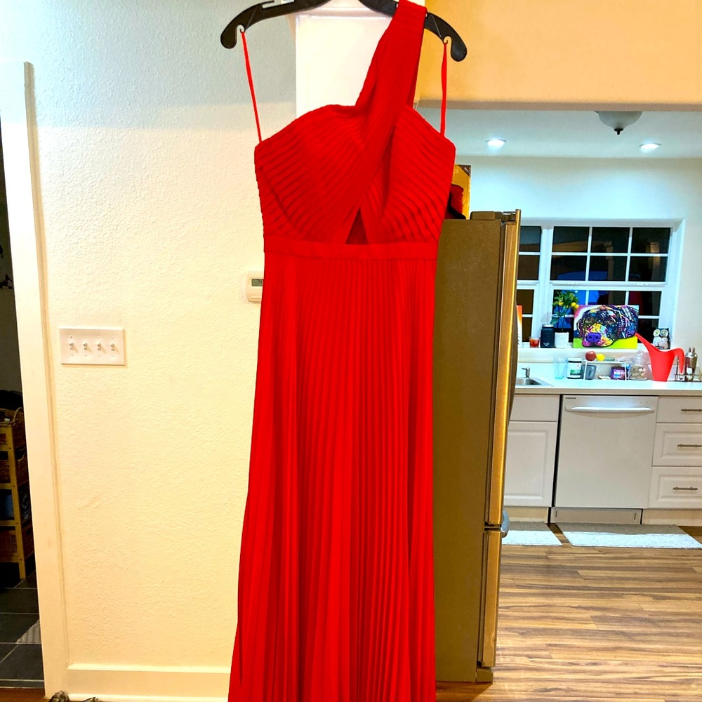 Formal dress by BCBG, Size 2 and only worn once. Absolutely beautiful!!